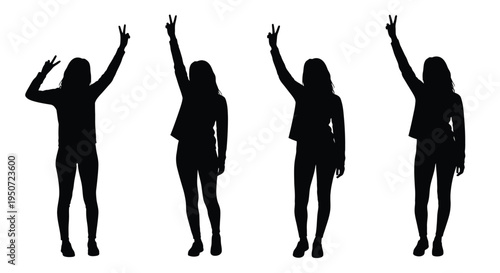 Four women cheerfully raise hands in victory poses a dark silhouette