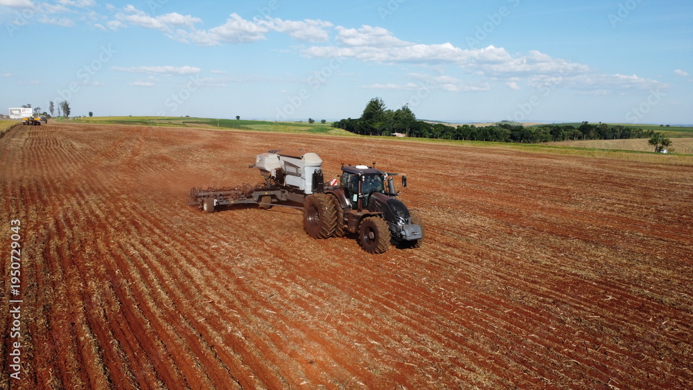 Obraz premium tractors working in the field