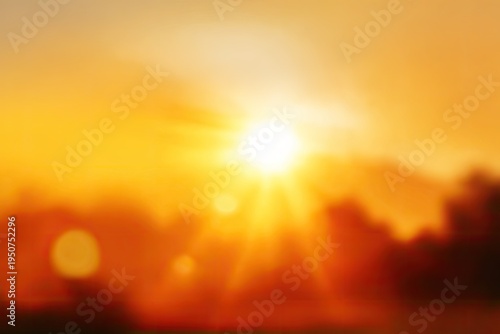 Blurred Golden Sunset with Bright Sun Rays and Warm Hues.