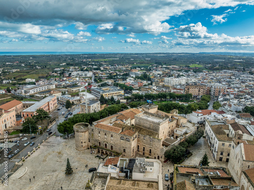 Discover Conversano: Arial view Pugliese Gem featuring the Acquaviva Castle, Stone-Carved Cathedral, Ancient Medieval Alleys near Bari, Italy