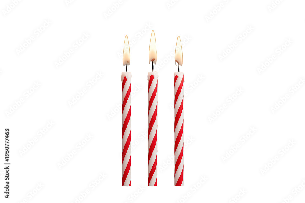 Obraz premium Three red and white swirl pattern lit birthday candles bringing light and warmth to a festive celebration, with transparent background