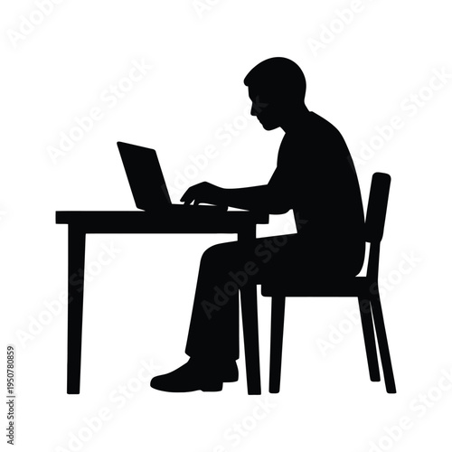 silhouette of a man working on laptop