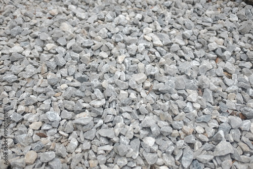 Crushed gray gravel stones close-up texture