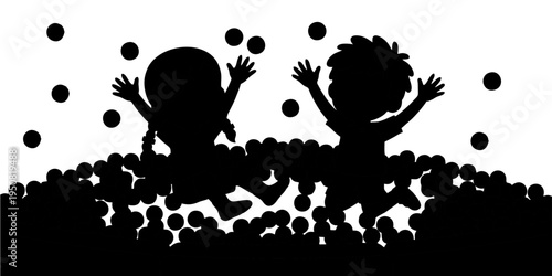 Silhouette of children playing in a ball pit
