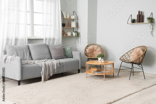 Comfortable sofa, wooden ta...