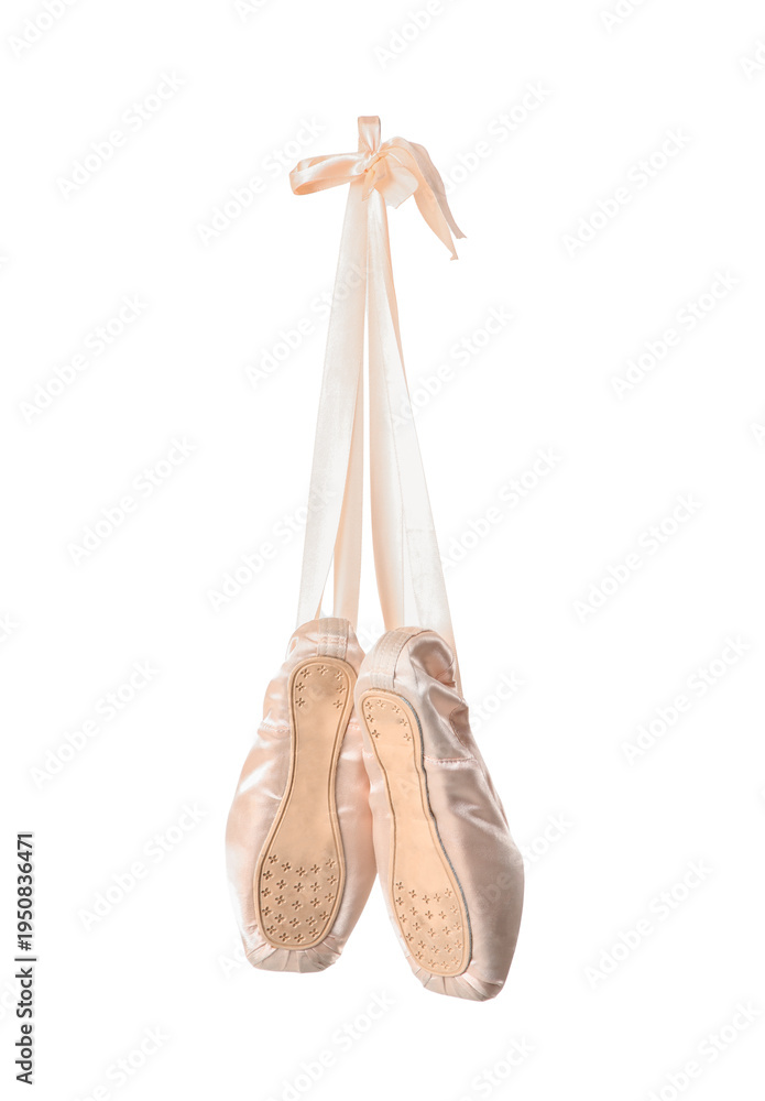 Fototapeta premium Pink pointe shoes hanging on white background, back view