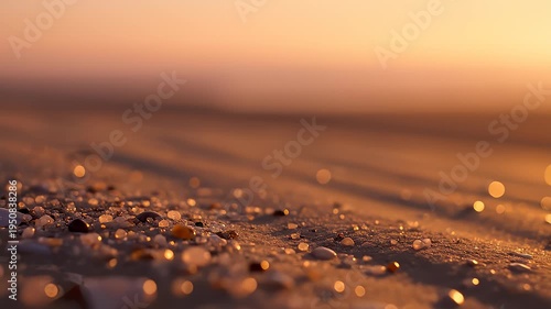Golden Hour Beach Sand With Sunlit Bokeh And Gentle Waves