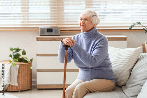 Thoughtful senior woman wit...