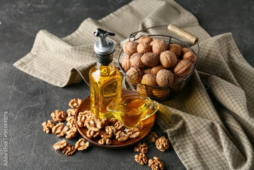 Tasty walnuts with bottle a...