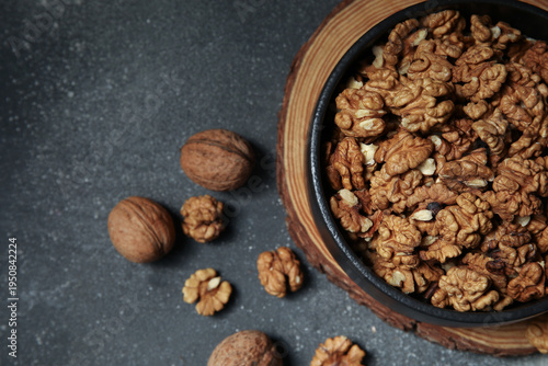 Bowl with shelled walnuts o...