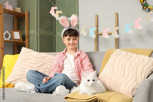 Cute little boy in bunny ea...