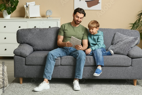Dad and little son playing ...