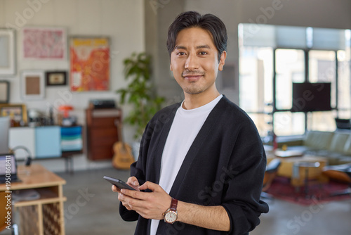 Confident businessman standing poised in the office