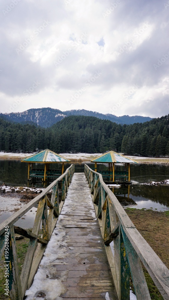 Naklejka premium Khajjiar Lake with frozen ice located at Himachal Pradesh Chamba district also called as Mini Switzerland of India
