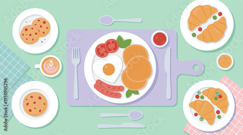 Top view of a diverse breakfast spread with pancakes, eggs, and croissants