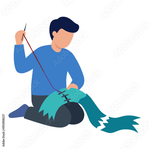 Man sitting on floor knitting blue scarf with needles and yarn carefully