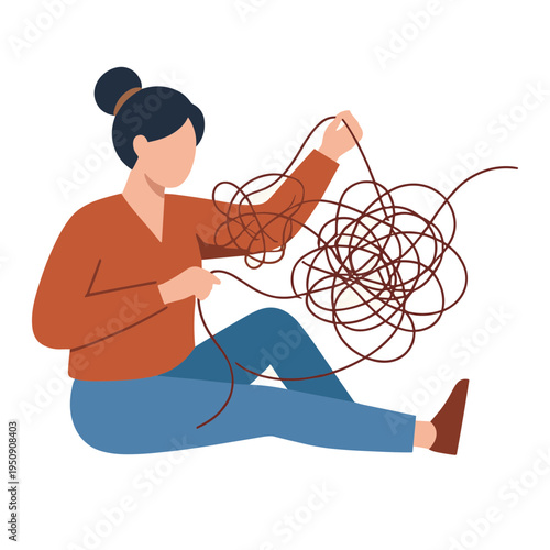 Woman sitting on floor untangling red yarn with hands