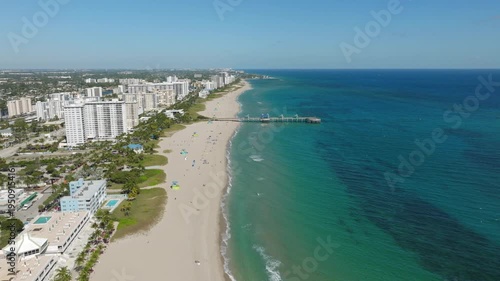 Aerial View of Pompano Beach With Pier, Bridge, Boats, Waterfront, Residential Blocks, Roads and Ocean Horizon