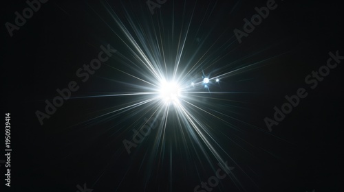 A bright glowing white starburst lens flare with subtle optical ring artifacts in the center of a pure dark black background