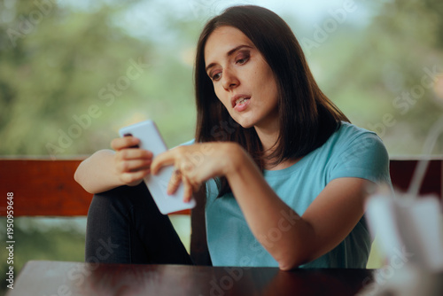 Nostalgic Woman Stalking her Ex on Social Media 
Infatuated girl looks with envy on the internet and stalks her ex-boyfriend