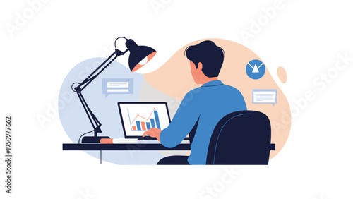 Male professional working on a laptop at his office desk with data charts and graphs displayed on the screen and wall.