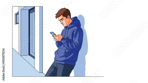 Young man wearing a blue hoodie and jeans leaning against a wall while looking intently at the screen of his smartphone.