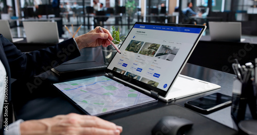 Картината върху платно Digital Hotel Booking Tool Helps Woman Plan Business Travel