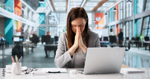 Determined Businesswoman Takes A Moment For Heartfelt Prayer