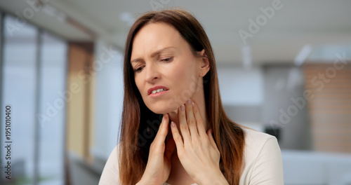 Neck Pain And Salivary Gland Issues. Woman Experiencing Throat Discomfort Free Download Neck Pain And Salivary Gland Issues. Woman Experiencing Throat Discomfort - GFXLoad