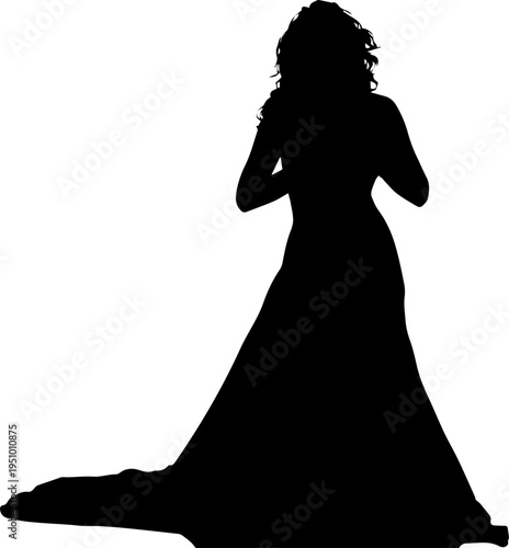Vector silhouette of an elegant woman in a long flowing gown or wedding dress isolated on white background