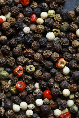Obraz na plátně Close-Up of Vibrant Mixed Peppercorns Displaying Texture and Variety