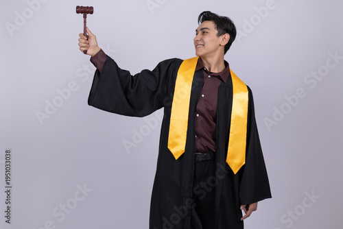 Judge with gavel in hand looking to the side