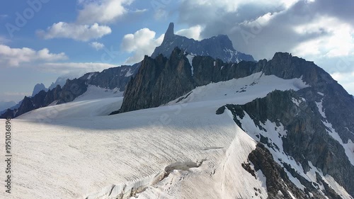 Amazing view to the glaciers of the Mont Blanc range on the Italian side. In the background the Dent du Géant. Wonderful landscape. Summer time