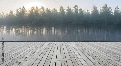 Wooden deck overlooking a misty pine forest at sunrise