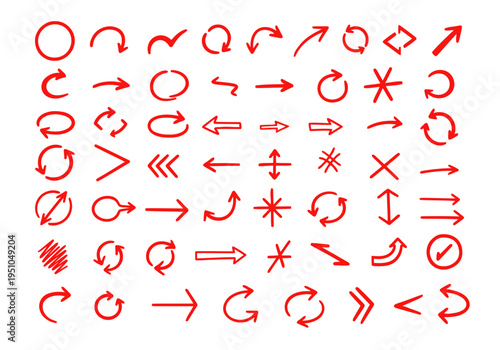 Collection of red hand drawn arrow shapes and symbols isolated on white