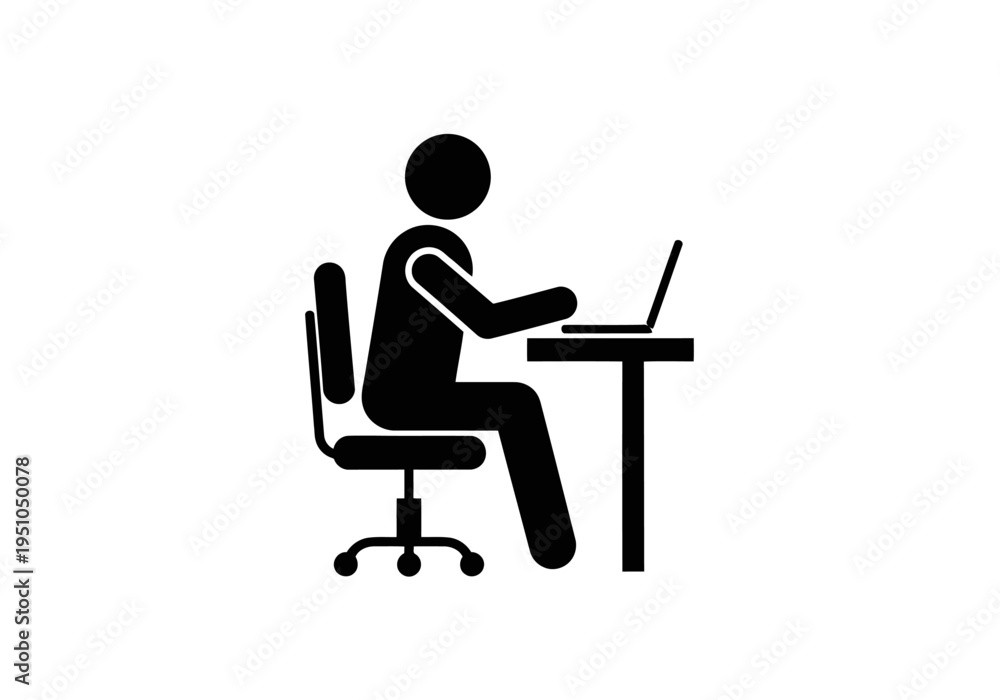Fototapeta premium Person sitting at desk working on laptop computer