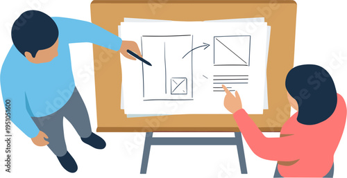 People collaborating on a graphic design project on a large board