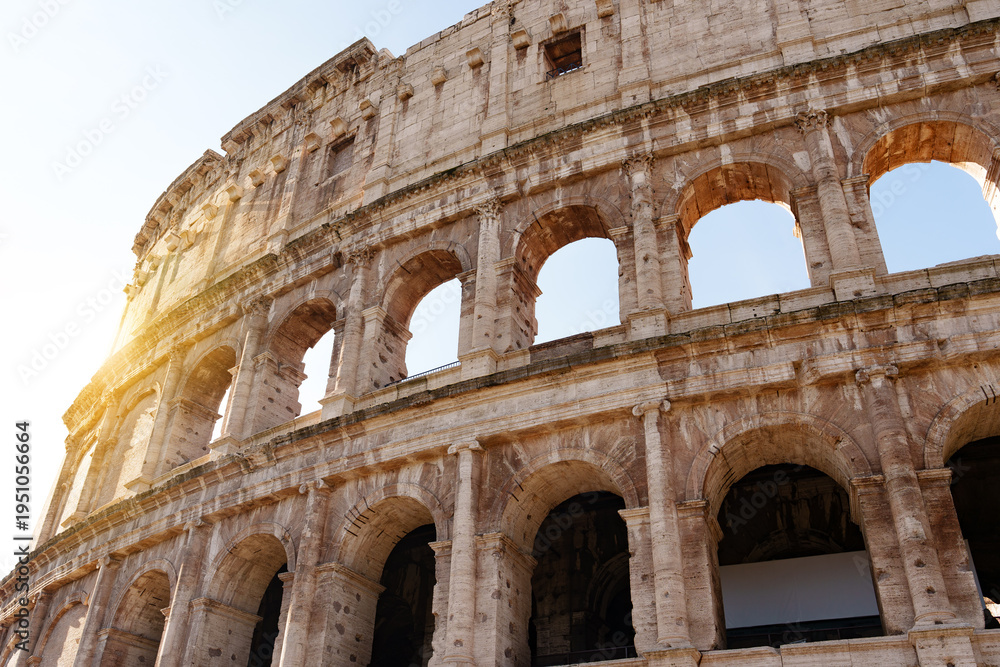 Obraz premium Explore the Colosseum in Rome during a clear sunny day