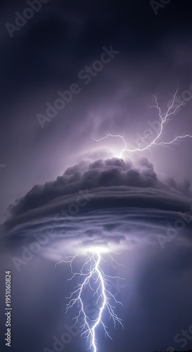 Intense electrical discharge illuminates ominous storm cloud formation overhead