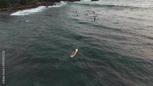 longboard surfer girl cinematic drone view Hiriketiya Sri Lanka tropical beach perfect waves sunny coastal surfing scene