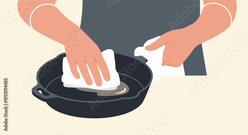 Hands clean a cast iron skillet with a cloth, preparing it for use