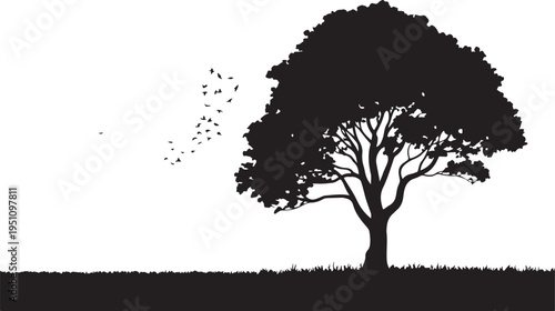 Silhouette of a tree with birds flying around it in a serene landscape