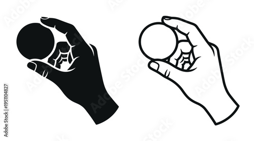 Two hands delicately holding spherical objects contrasting black and white dramatic silhouette