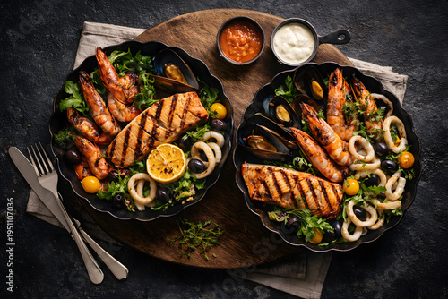 Delicious Seafood Platter with Grilled Salmon Shrimp Mussels Squid Rings