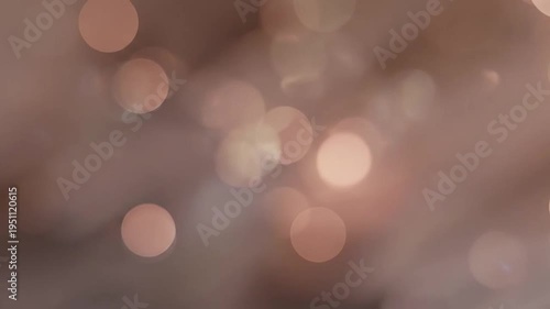 Soft warm bokeh lights create a dreamy and elegant abstract background