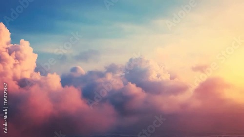 Beautiful vibrant clouds glowing with warm colors during a serene sunset