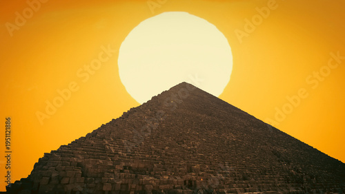 Fotografía Great Pyramid of Giza Peak with Large Sun Background in Egypt with copy space