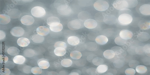 Abstract colorful glowing bokeh lights background with soft blurred circles and festive sparkling night atmosphere