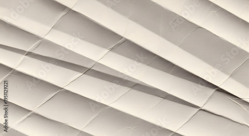 A close-up view of white window blinds with slats