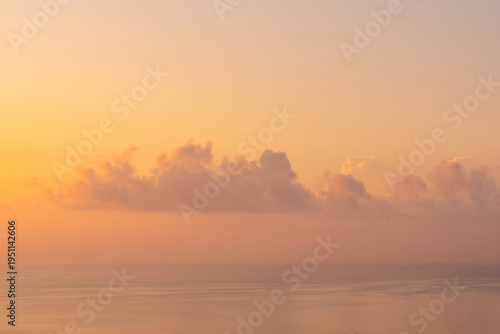 Obraz na płótnie Beautiful and Romantic Sunrise Morning Glow Over the Sea